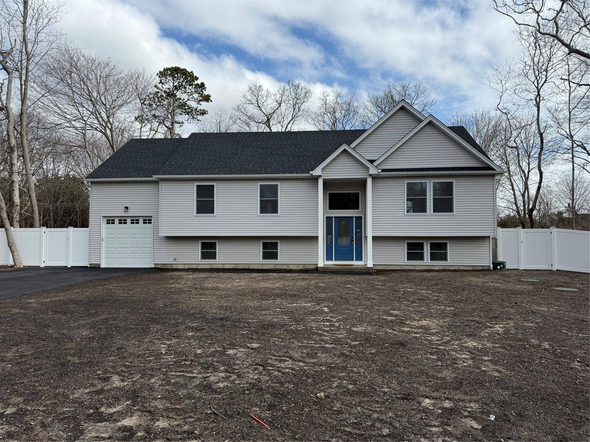 NEW RAISED RANCH ! This modern home features hard wood floors, custom moldings, fireplace, white Shaker cabinets, quartz countertops and stainless steel appliances.