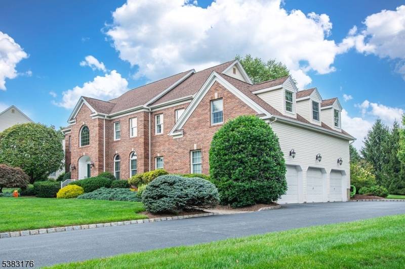 Meticulously maintained and lovingly cared for by the original owners, this stately, brick colonial sits on a private, level acre in a highly sought after neighborhood.