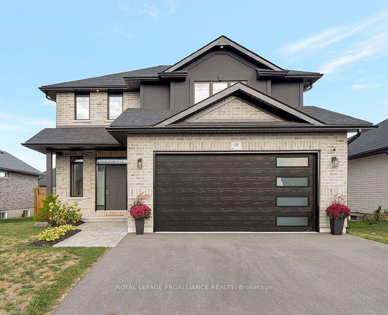 Welcome to refined living in this custom built beauty 18 Raycroft Drive in Belleville's Settler's Ridge.
