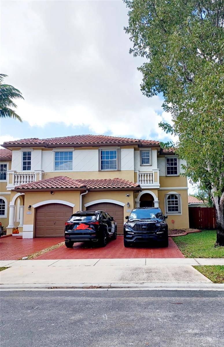 This two story townhouse nestled in the highly coveted community of Santorini at Vizcaya sits on the corner, allowing extra yard space that adds to the overall allure.