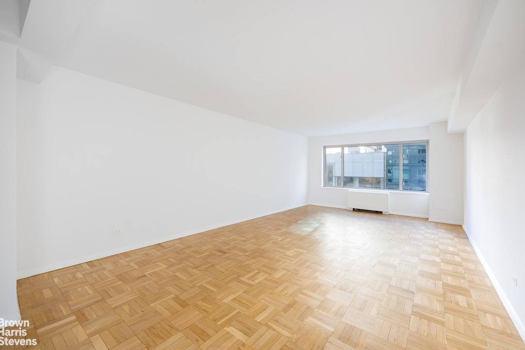 Welcome to a remarkably spacious and elegantly positioned residence at 200 East 57th Street, Apartment 8D.