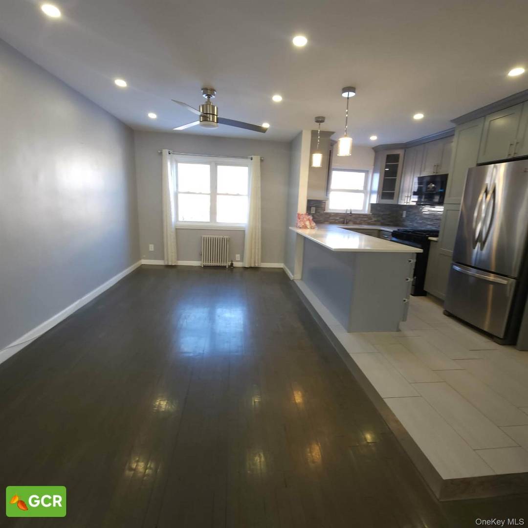 Introducing a sophisticated and move in ready single family residence perfectly positioned in the heart of Queens Village.