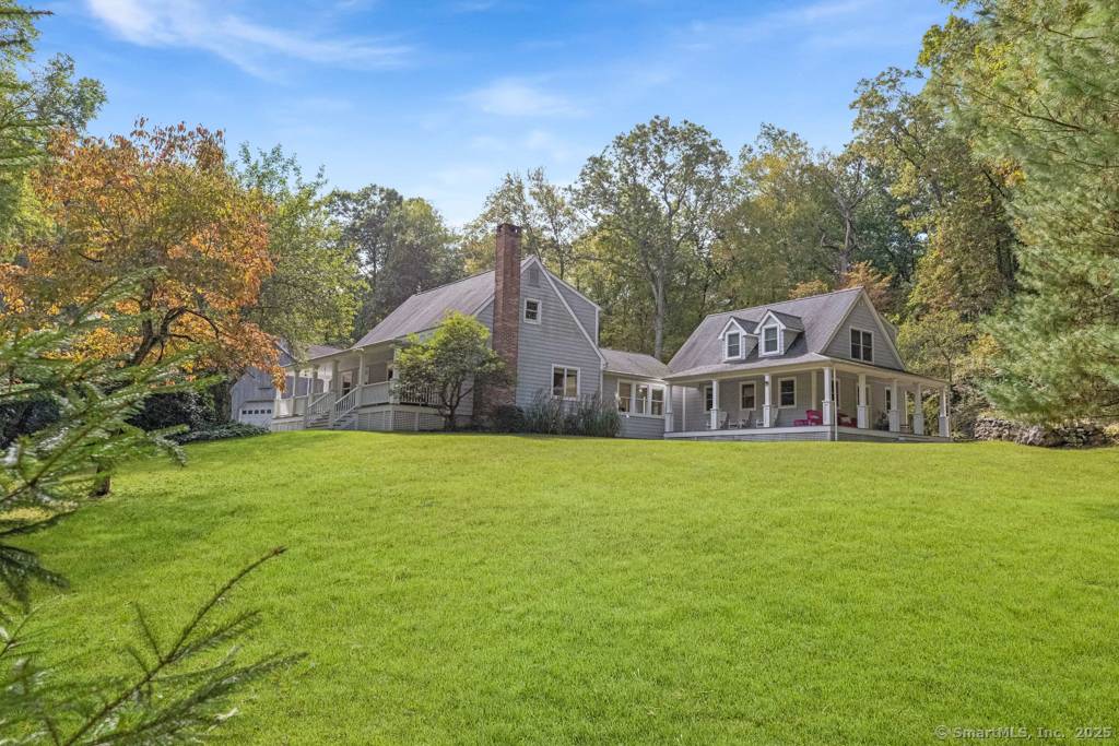Unique Multi Generational Property on 2 Private Acres.