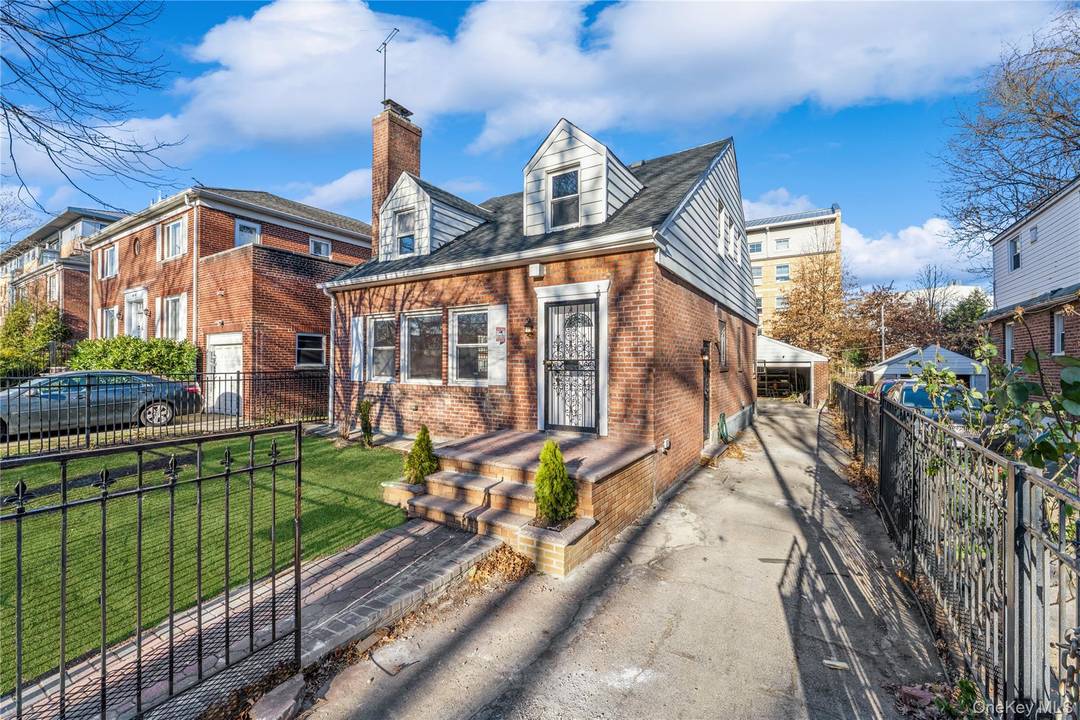 Tastefully renovated Immaculate SOLID brick single family home nestled on a tree lined block.