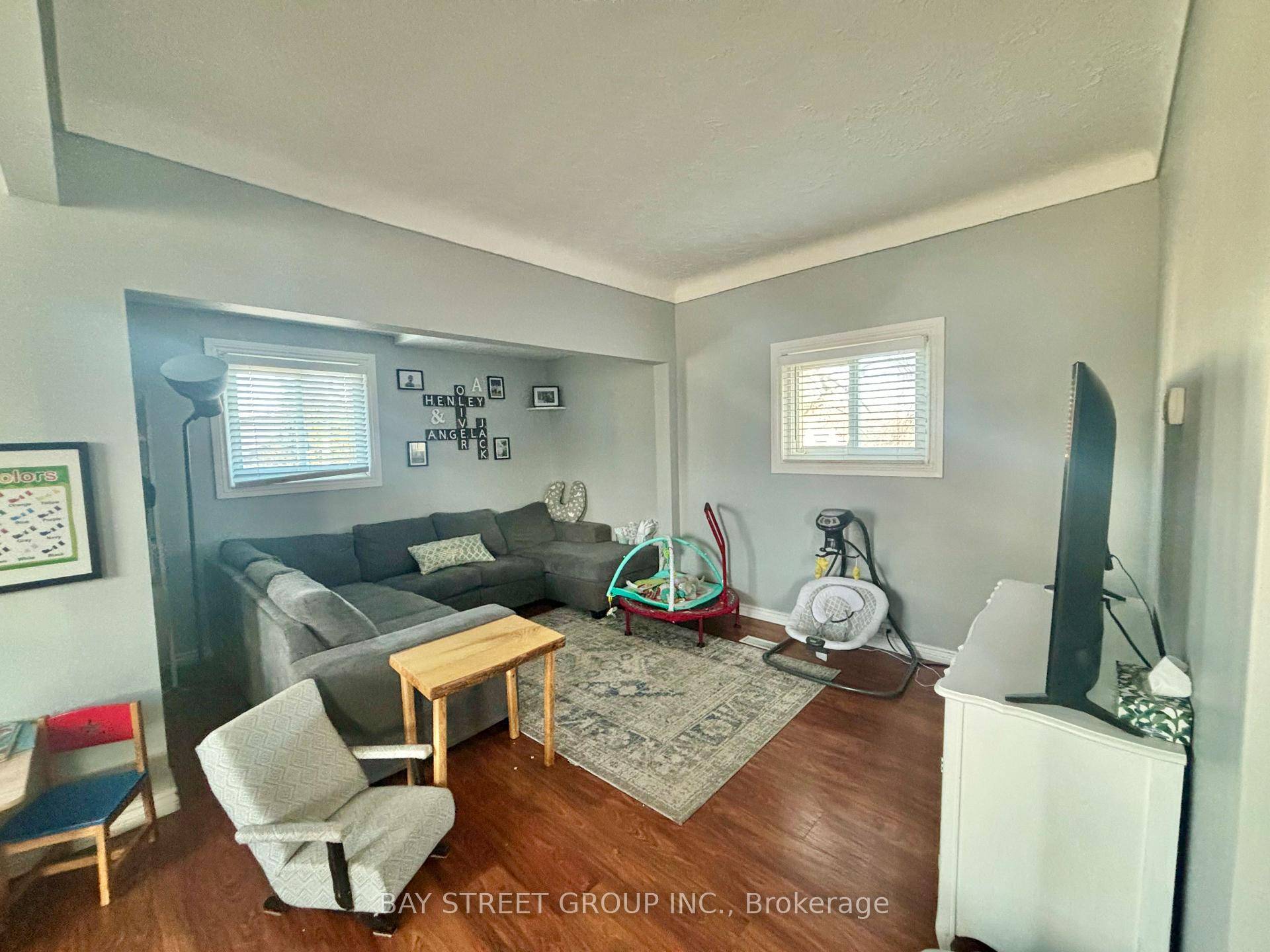 This charming 3 bedroom, 2 bathroom home sits on a desirable corner lot, offering 1, 300 sq ft of bright, inviting living space with large windows throughout.