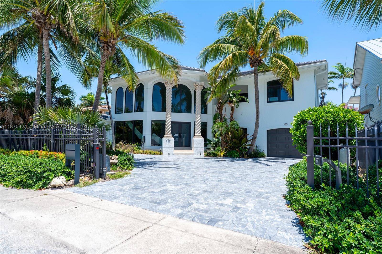 An absolutely Gorgeous chic home located steps away from the sand.