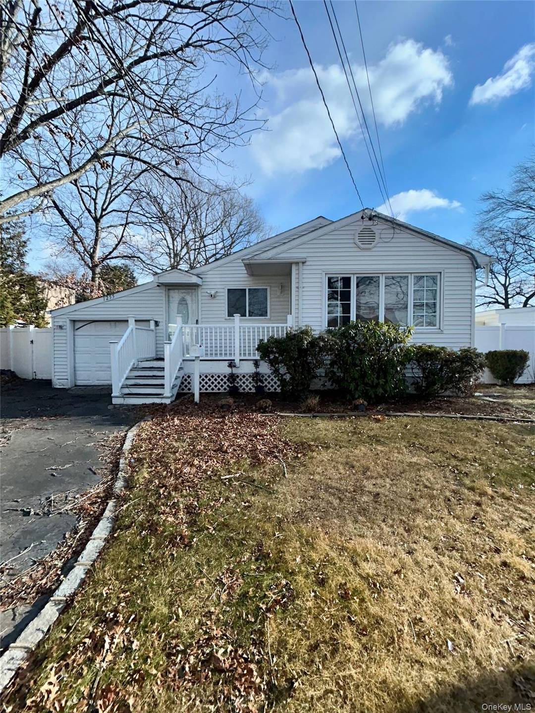 1255 Udall Road, Bay Shore NY, has 3 bedrooms, 1.