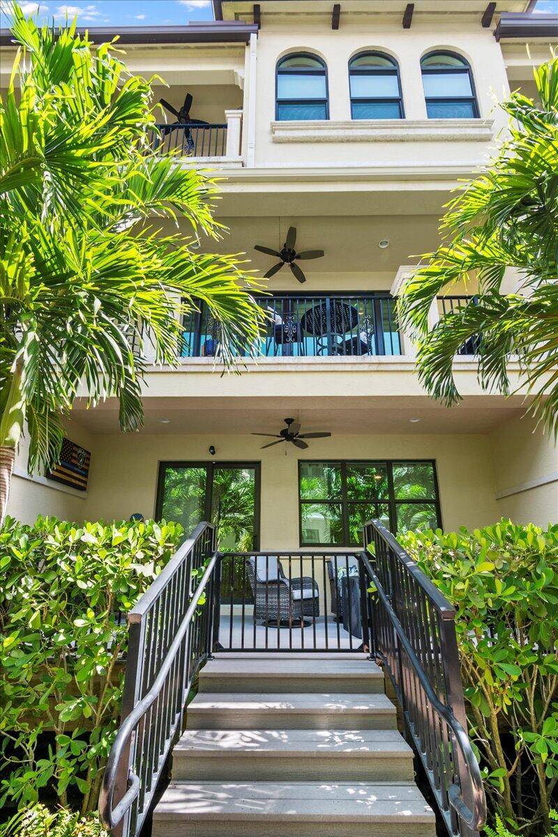 Come enjoy coastal living in this stunning, tri level townhome nestled in the highly desirable, gated, intracoastal community of Casa Del Mar in Boynton Beach with an available boat slip.