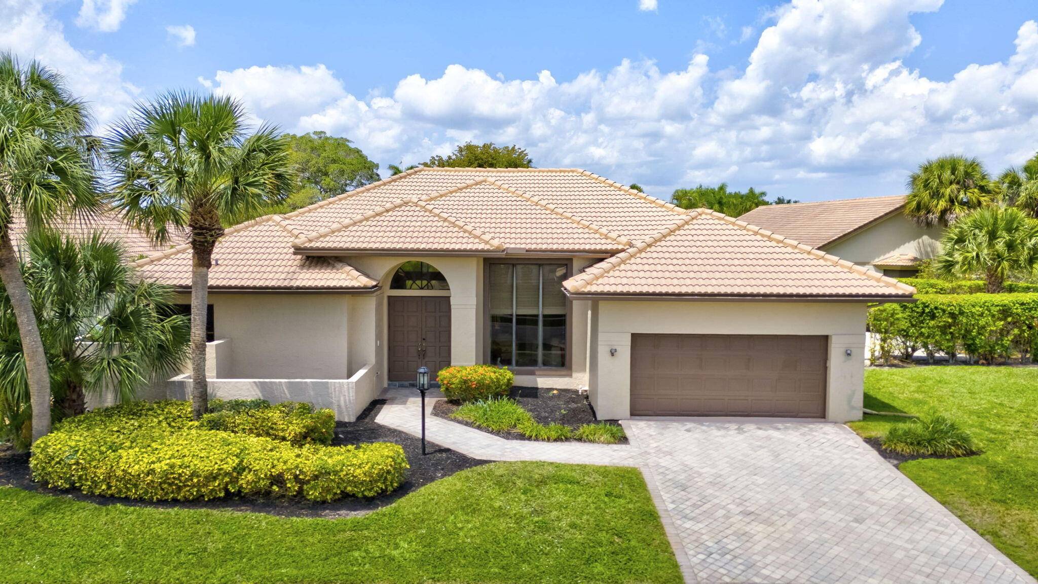 Nestled in the prestigious Stonebridge country club community in Boca Raton, this bright and airy residence sits on a rare double corner lot, offering exceptional privacy and endless potential for ...