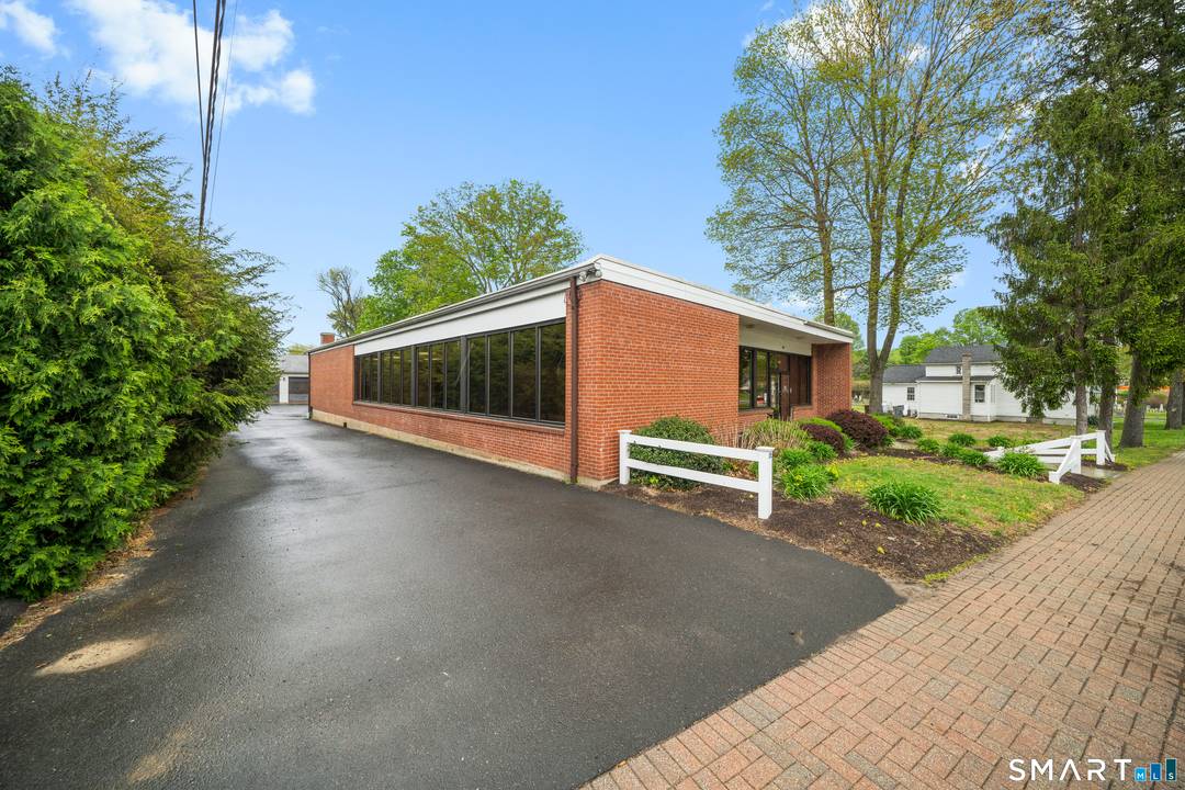 This fully renovated 3, 864 square foot brick office building, built in 1945, sits on less than half an acre.