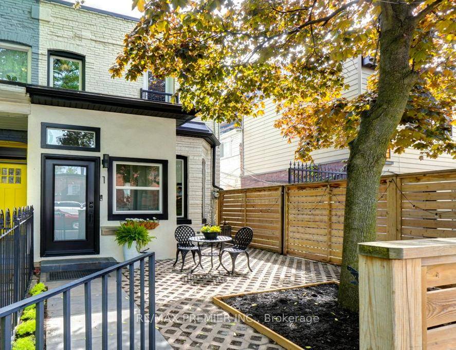 Discover a rare opportunity at 1 Gwynne a beautifully renovated end unit townhouse on a tree lined street that effortlessly blends historic character with modern luxury.