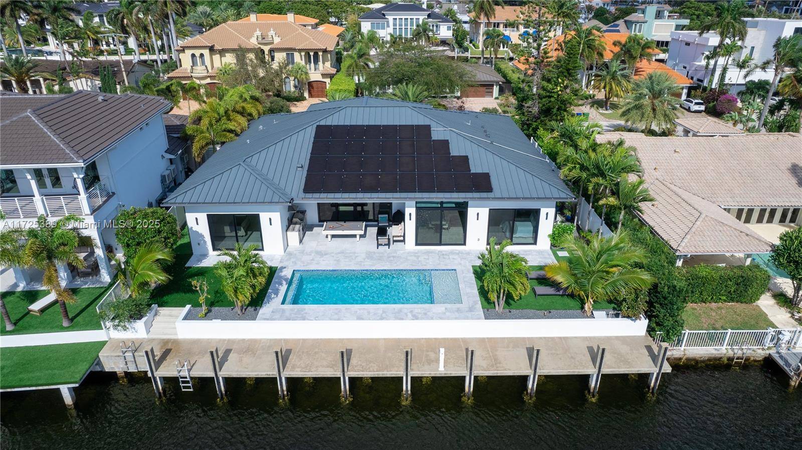 Own this elite newly constructed waterfront estate in THE LANDINGS completed in 2023.