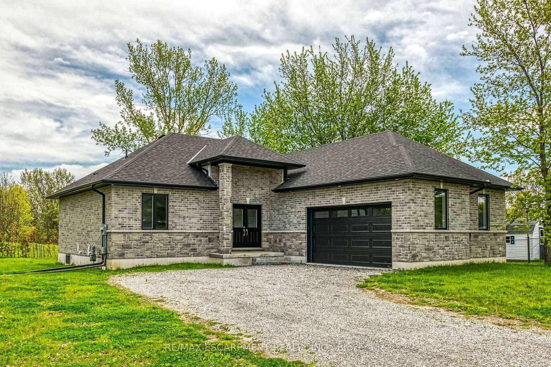 Stunning, Custom Built 3 bedroom, 2 bathroom Bungalow located in desired Peacock Point situated on 104 x 196 lot on sought after South Coast Drive.