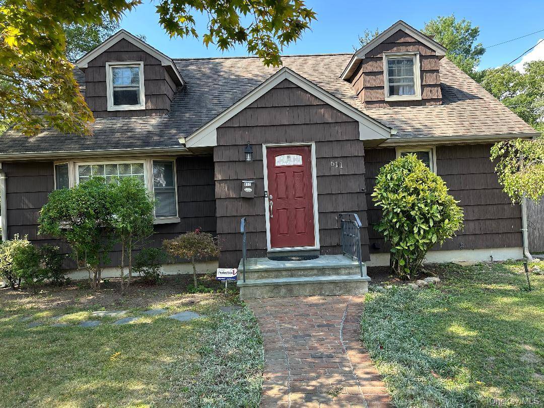 This home features a new kitchen, formal dining room, living room, office den, five bedrooms, 3 and 1 2 baths, laundry room, two additional kitchens, finished basement with walk out, ...