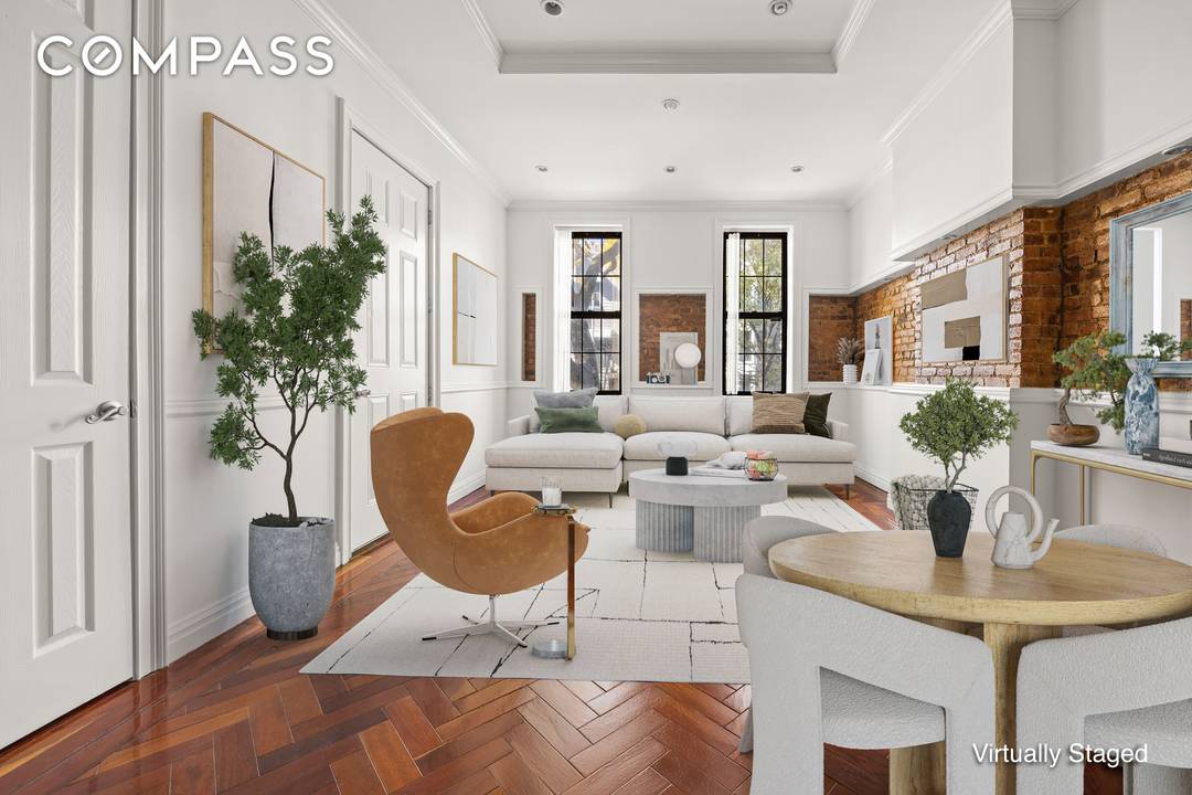 78 Pilling Street, a two family, 20 foot townhouse, spanning 3, 300, sq feet, 20 blends loft like living with pre war charm.