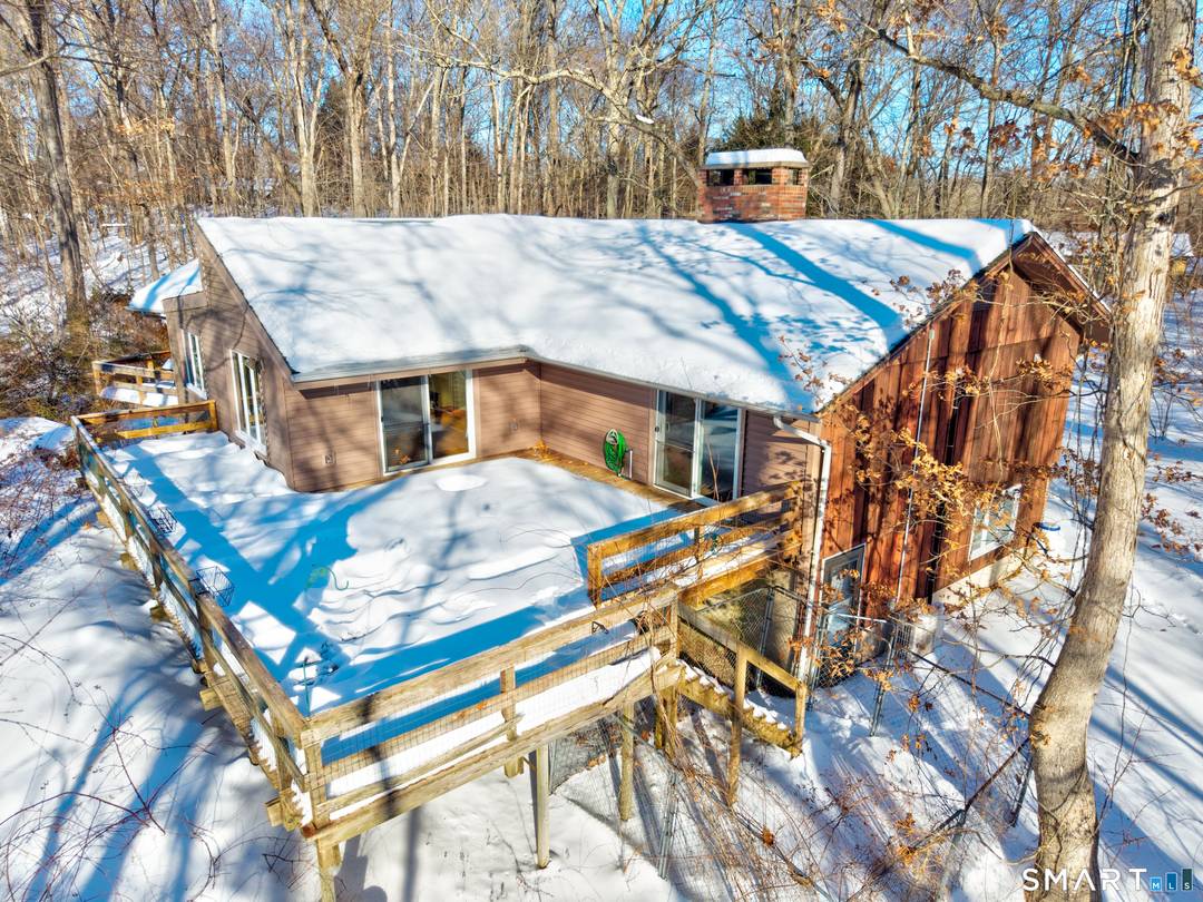 Welcome to 16 Merrywood Lane a spacious home tucked away in a very private setting while remaining incredibly convenient to everything East Lyme has to offer.