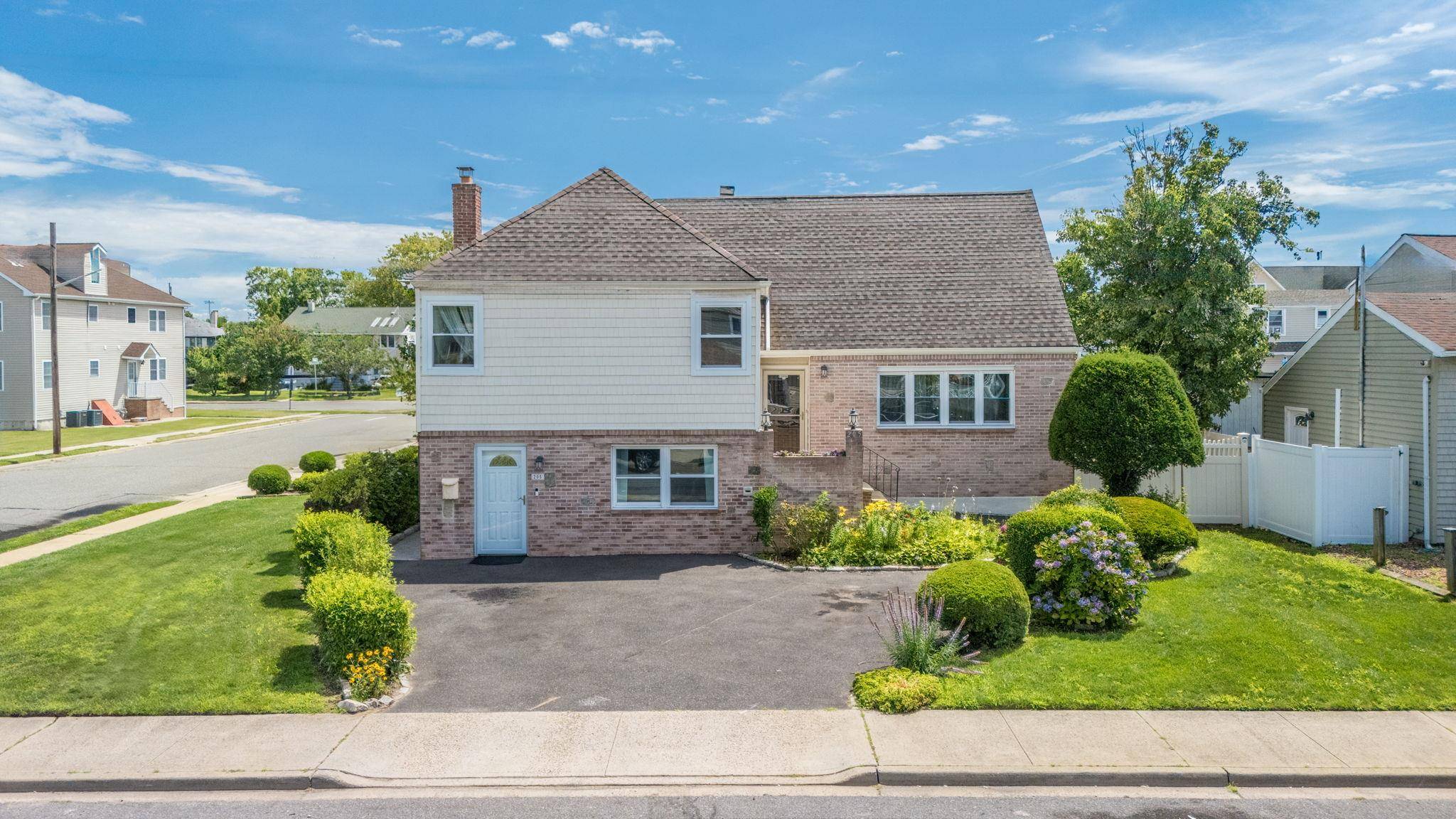 Welcome to 205 Saint Marks Avenue, a lovely single family home located on a quiet residential block in vibrant Freeport.