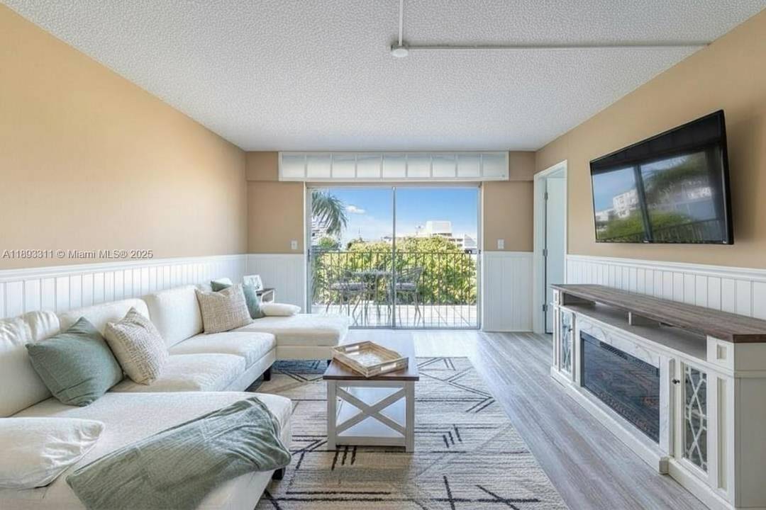 Experience abundant natural light and incredible privacy in this updated 2 bedroom, 1.