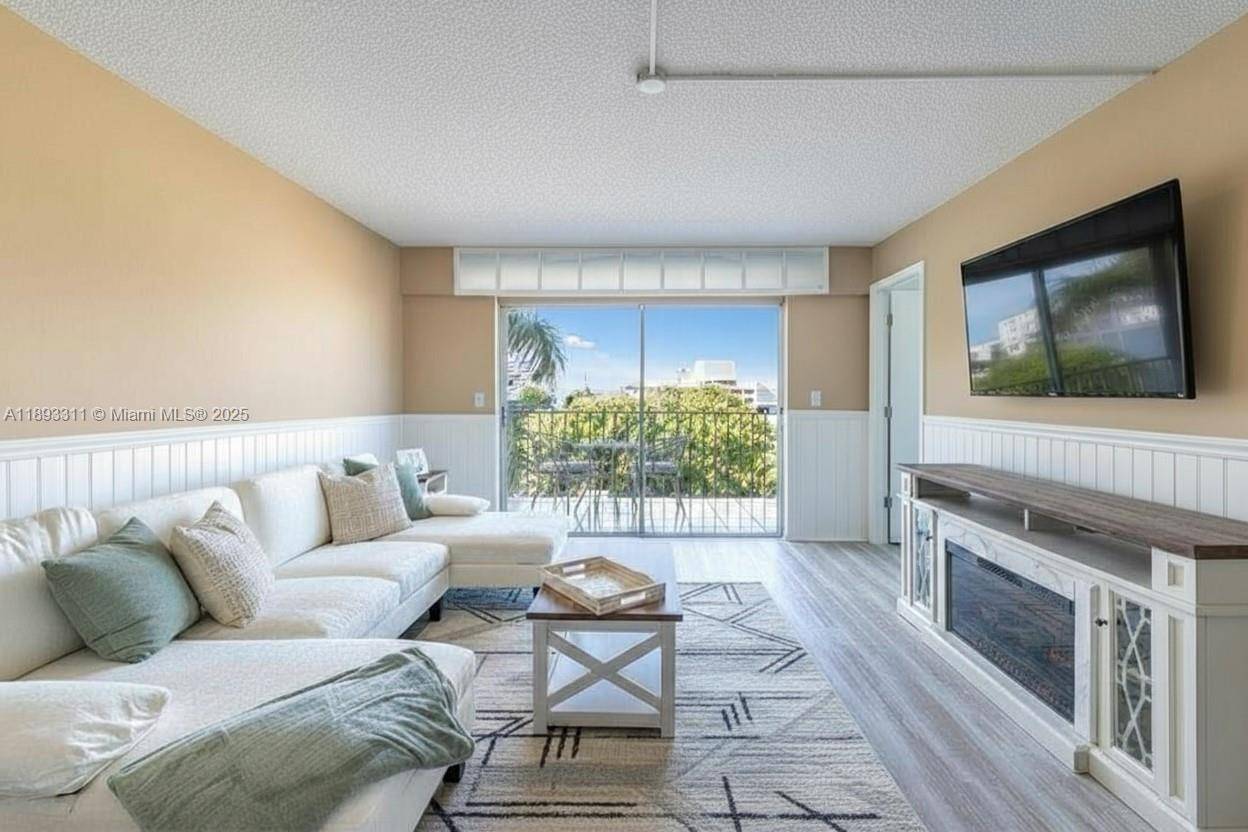 Experience abundant natural light and incredible privacy in this updated 2 bedroom, 1.