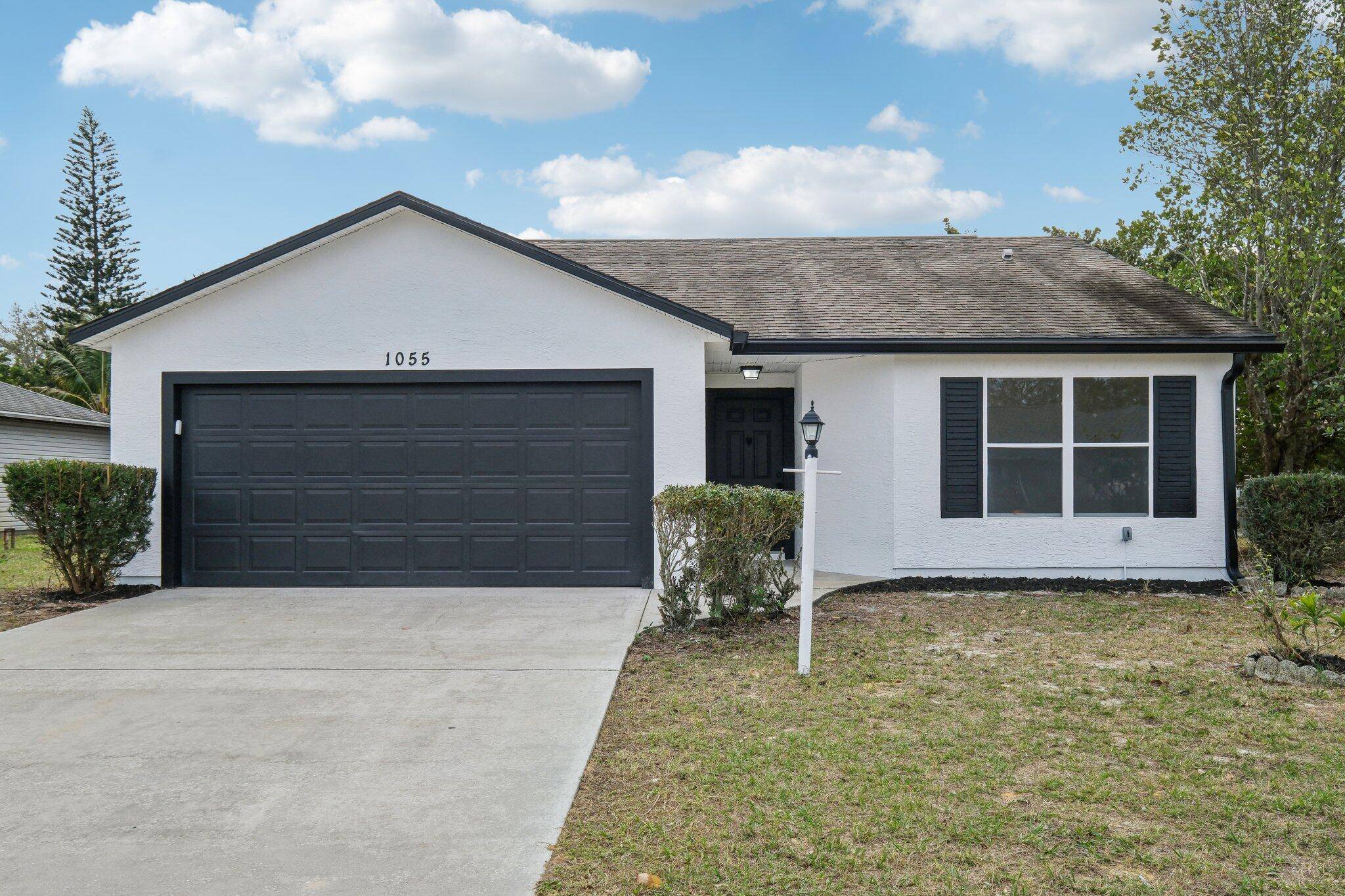 Step into this stunning, freshly updated home that feels brand new from top to bottom !