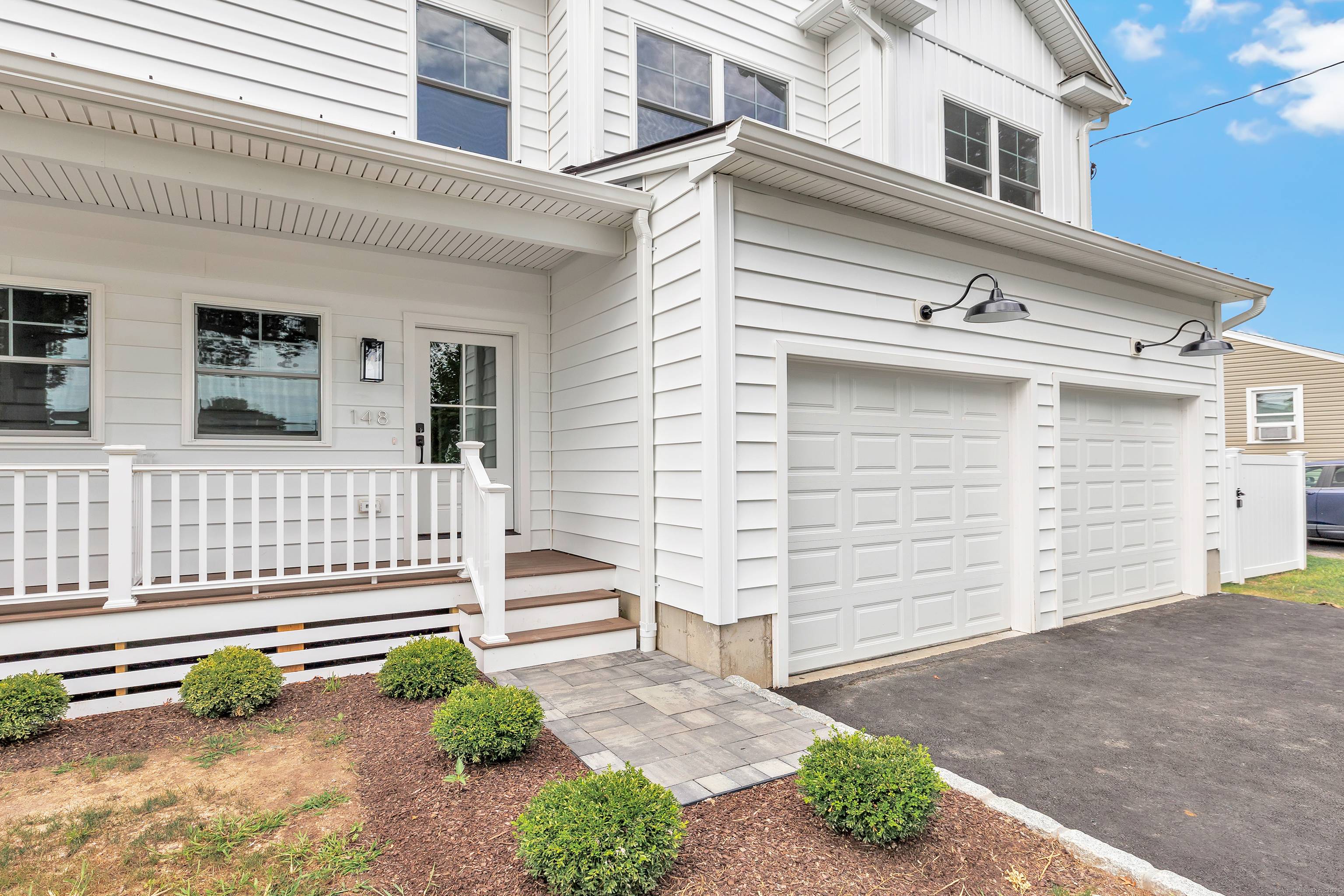 Welcome to this stunning, newly constructed duplex style residence where contemporary design and thoughtful details create a truly elevated living experience.