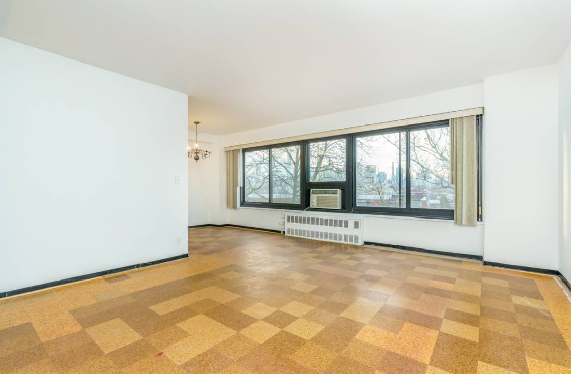 This two bedroom co op features an oversized living room dining area, kitchen and walk in closet right by the door for easy storage.