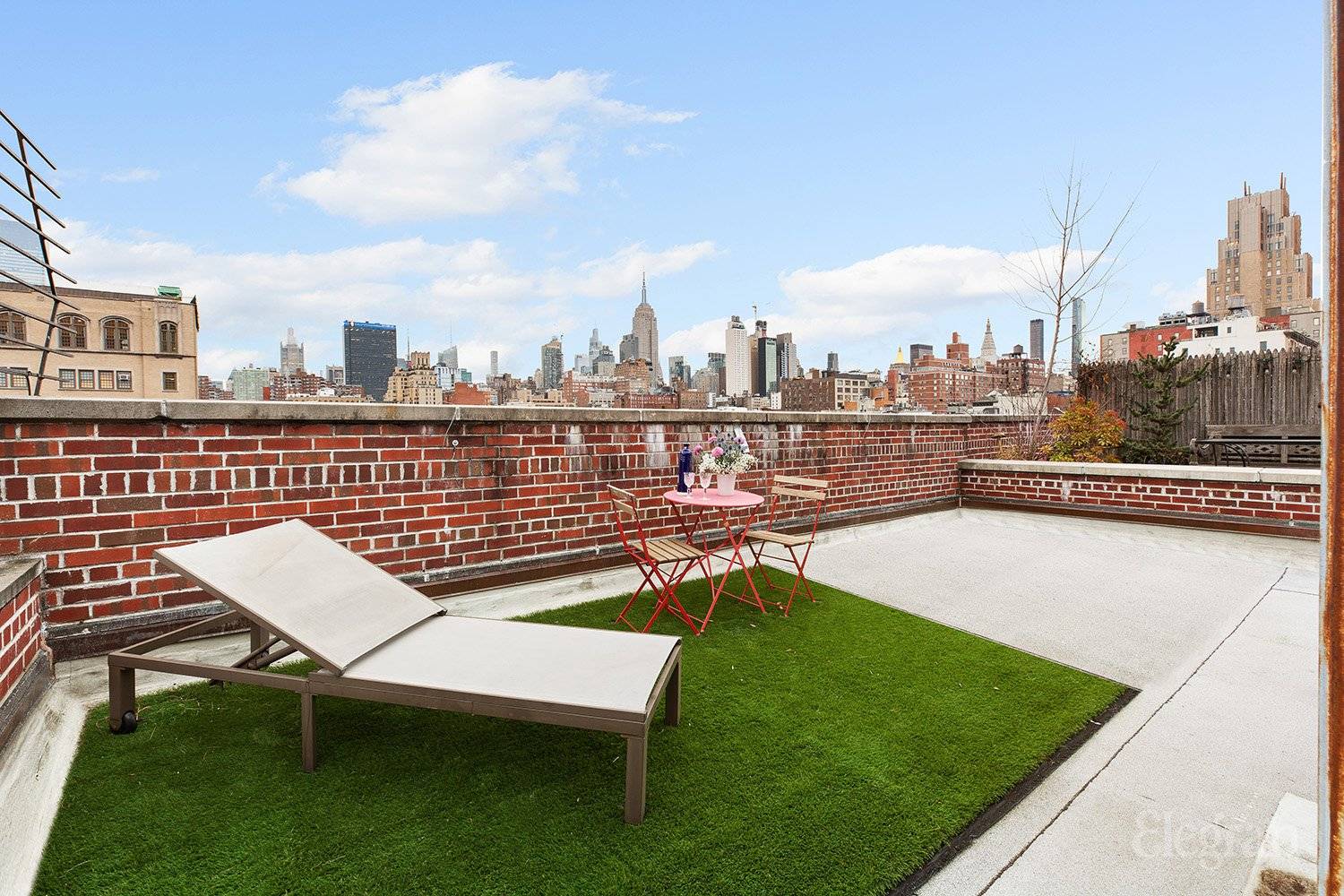 This serene Manhattan duplex offers luxurious NYC living with a private rooftop space.