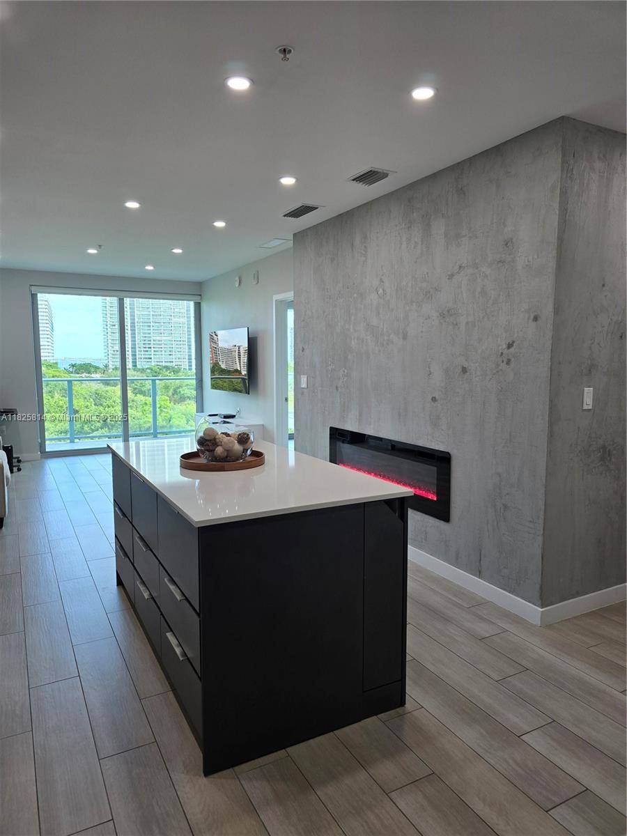 This contemporary one bedroom, one bathroom residence offers a light and airy atmosphere with an open Italian kitchen and living room, perfectly blending indoor and outdoor living.