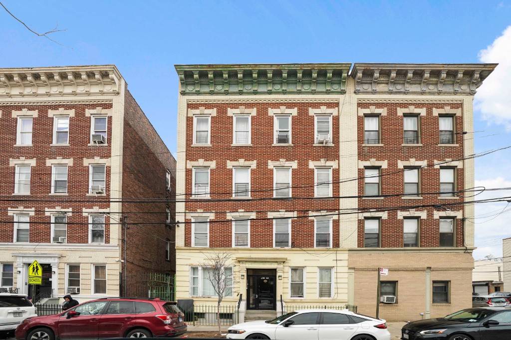 Discover the hidden gem of Ridgewood with this exceptional investment opportunity at 61 09 Catalpa Ave.