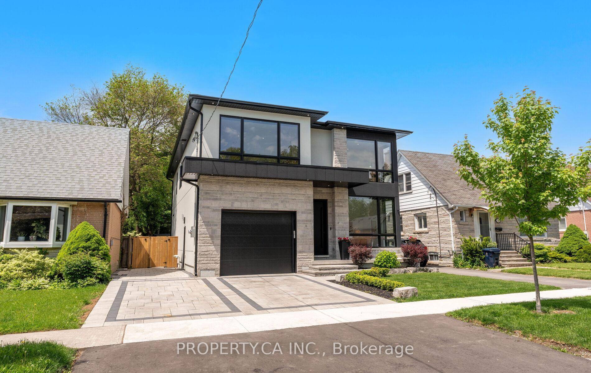 Located in the prestigious Clairlea neighborhood, this meticulously designed custom 2 story residence blends timeless elegance with modern luxury.