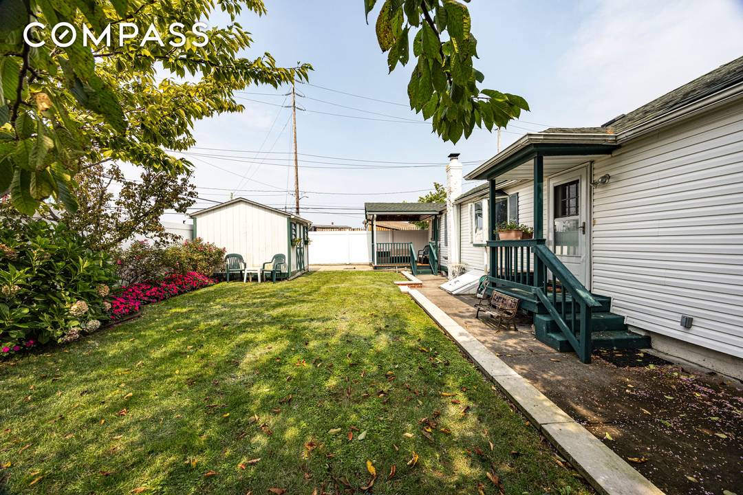 DOUBLE LOT PARKING GUT RENOVATED HOME Privacy, beauty, and possibility all in one remarkable property.