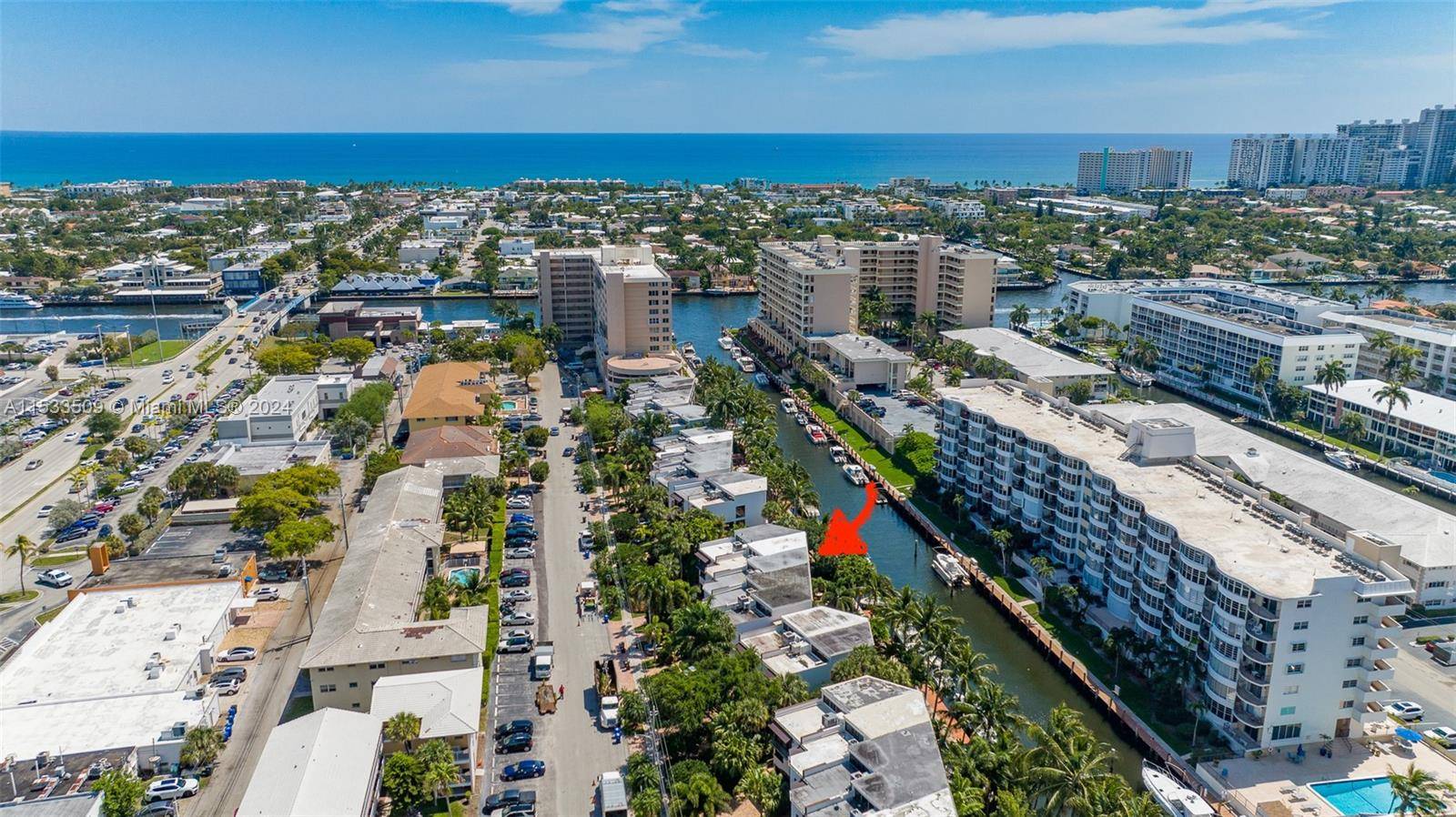 This stunning townhome offers direct waterfront living with an assigned boat dock in the prestigious Coral Ridge neighborhood, east of Federal Highway.