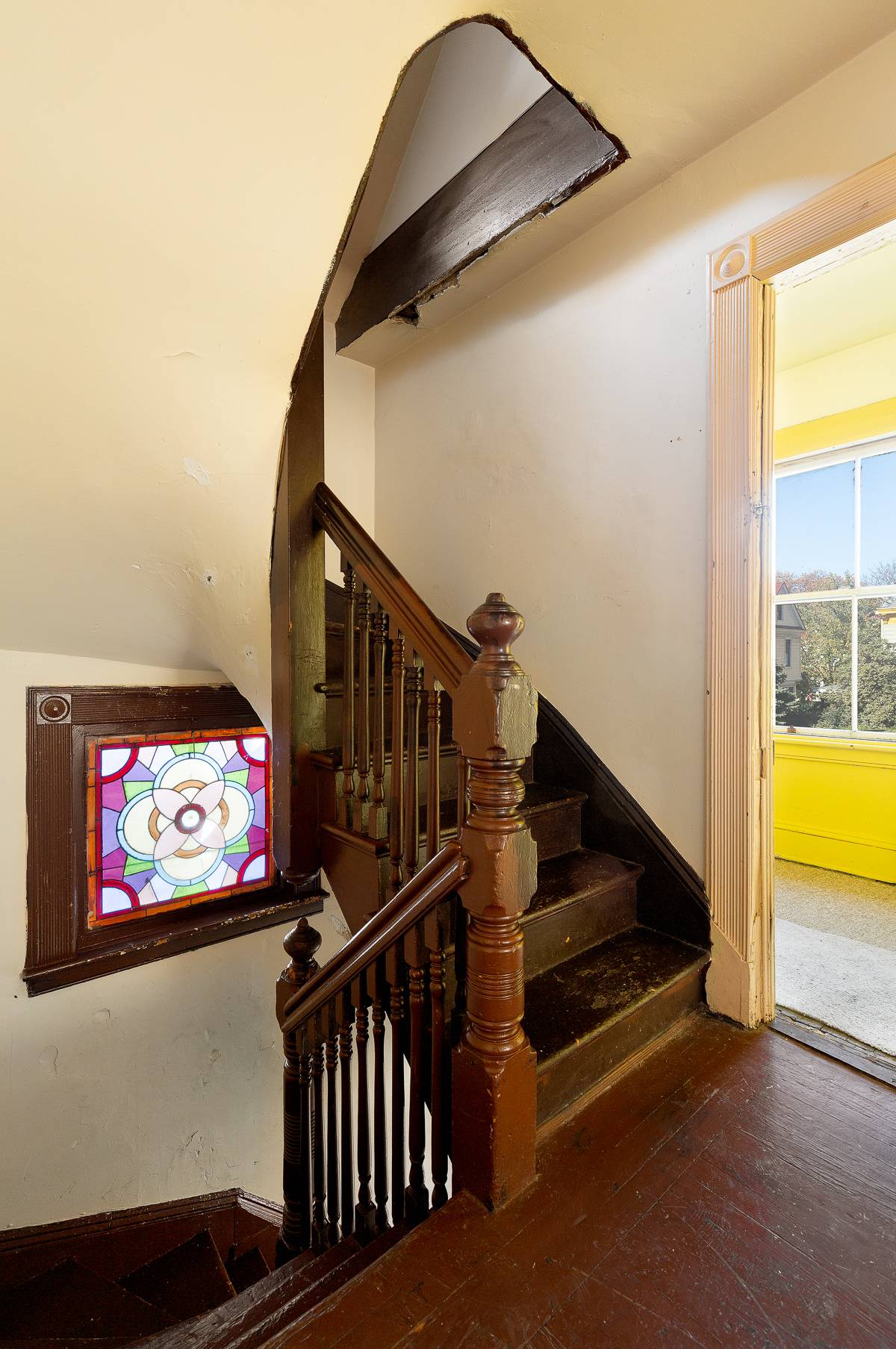 Grand two family freestanding home with deep and wide porch, driveway and detached garage on 50 ft wide x 85.
