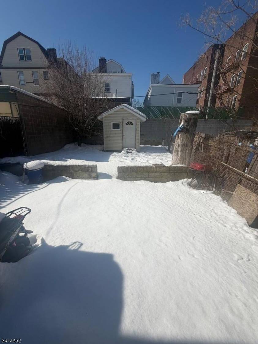 Spacious and flexible, this four level home features four bedrooms and four bathrooms and is currently utilized in a multi family style layout while zoned as a single family residence.