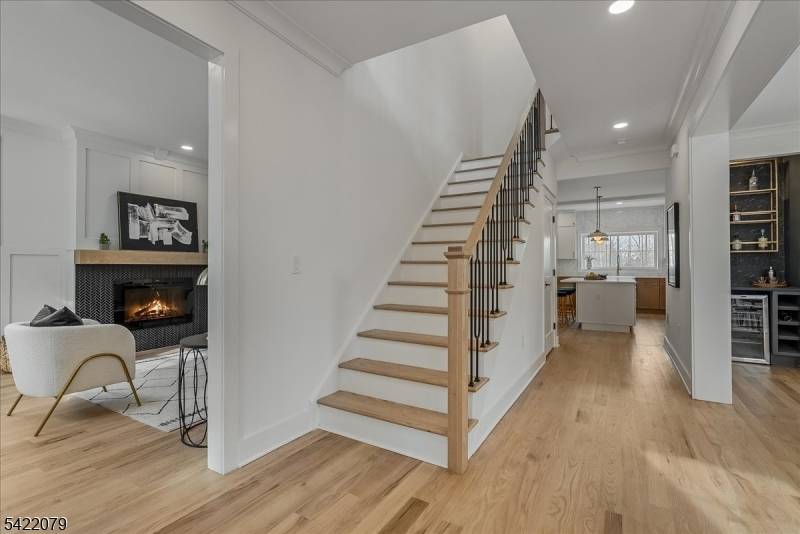 Welcome to 55 Forest Avenue, a completely renovated Center Hall Colonial where timeless charm meets modern luxury.