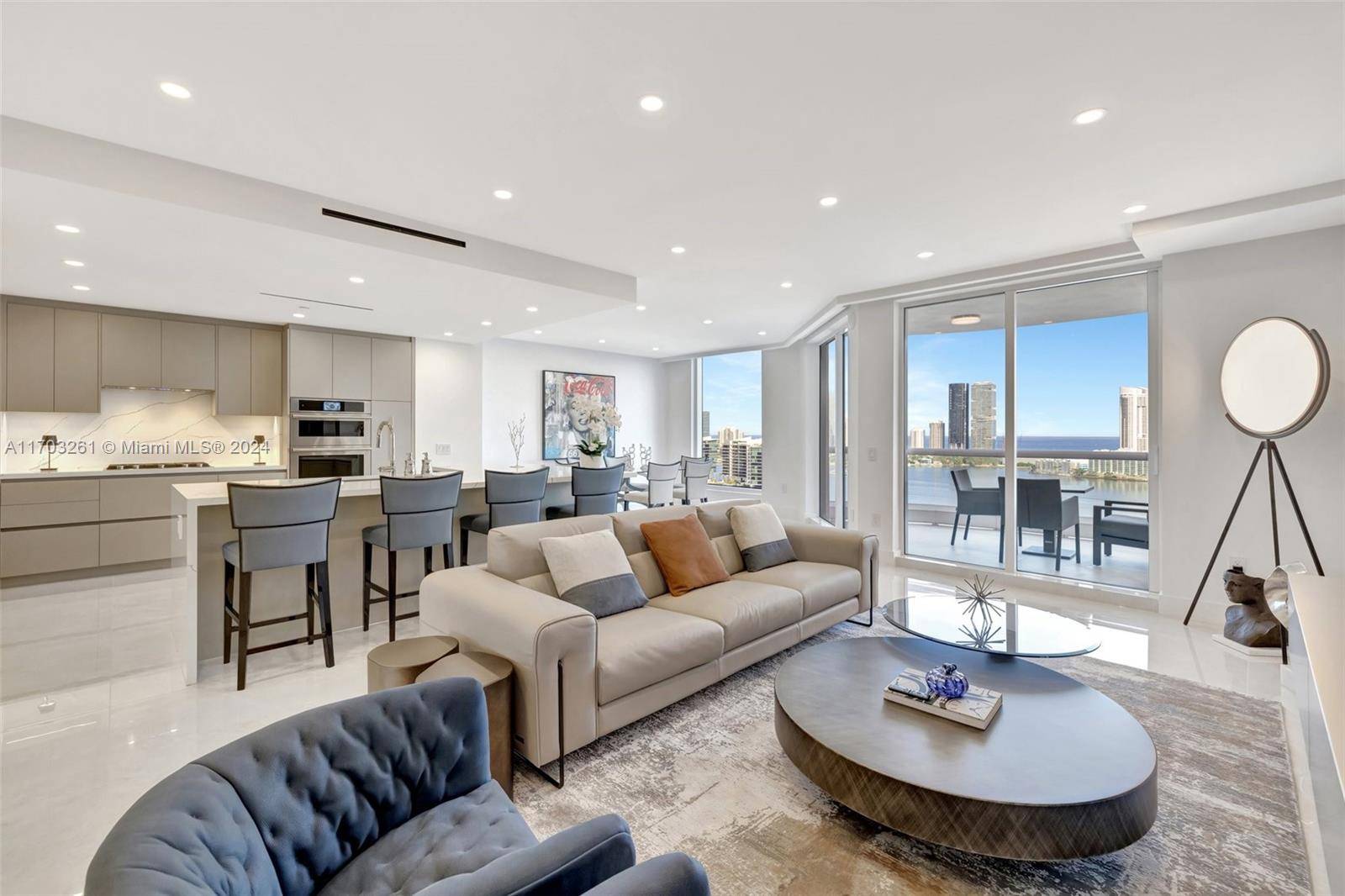 Completely updated in 2024, this luxurious residence in the highly sought after Bella Mare Condominium on Williams Island offers unmatched elegance.