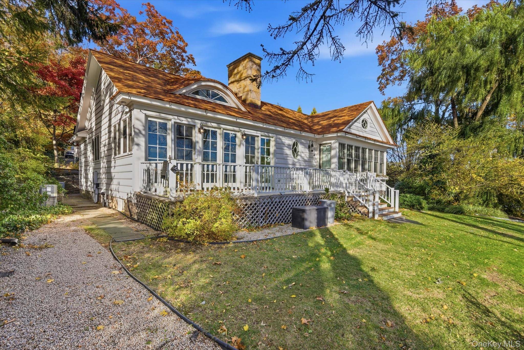 This gorgeous cottage, set on a large, secluded estate, features cathedral high ceilings and elegant architectural details, thoughtfully designed to harmonize beauty, comfort, and luxury.