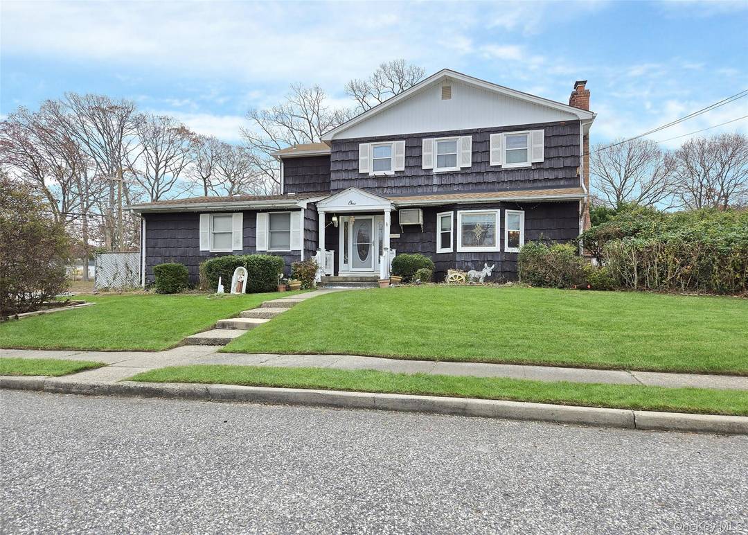Lovely Colonial with 4 Bedrooms and 2 1 2 Bathrooms.