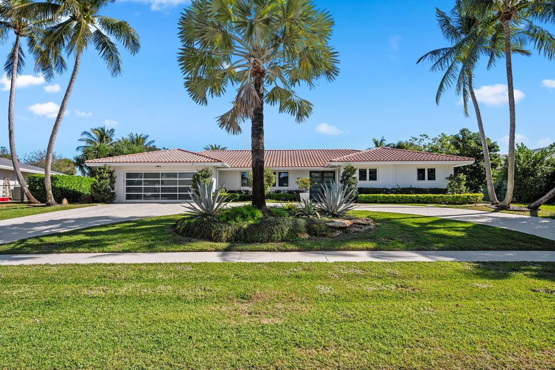 Unobstructed Views from this stunning 5 Bedroom plus Den home overlooking the North Palm Golf Course will not disappoint.