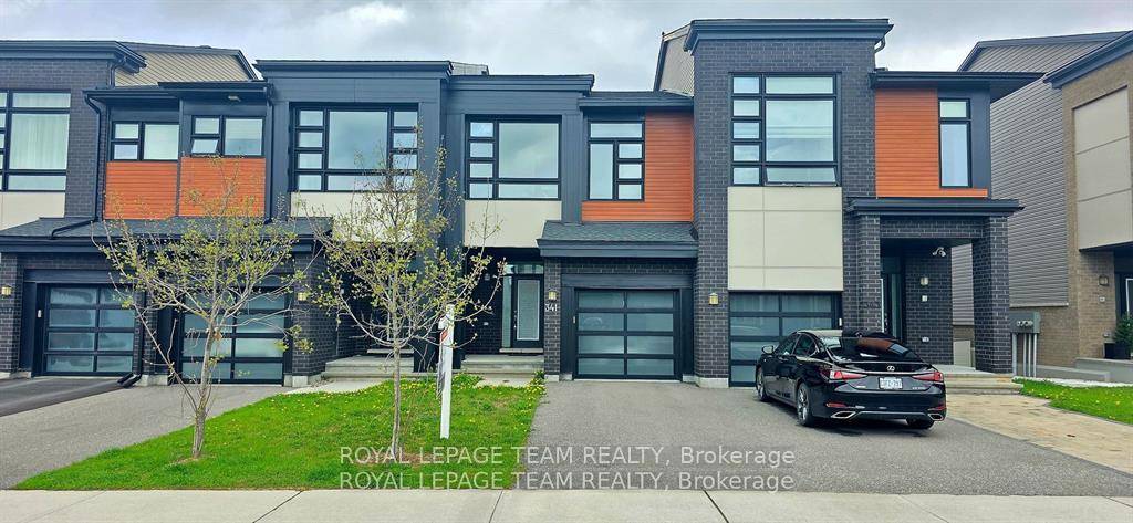 Welcome to this beautifully maintained 3 bedroom executive townhouse in the sought after, family friendly community of Riverside South, located on a peaceful, quiet street.