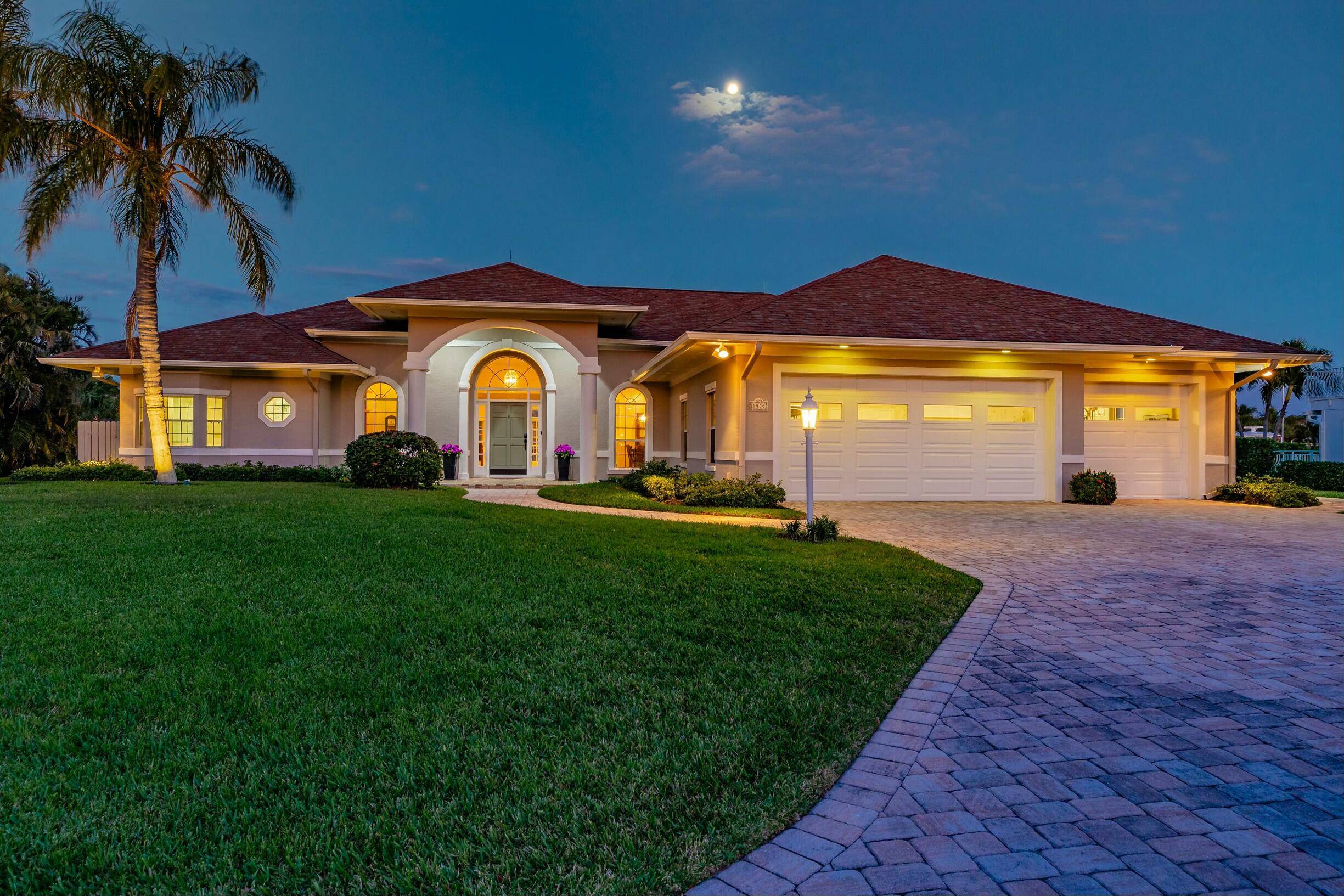 Luxurious living in the deep water dock community of The Moorings yacht and country club.