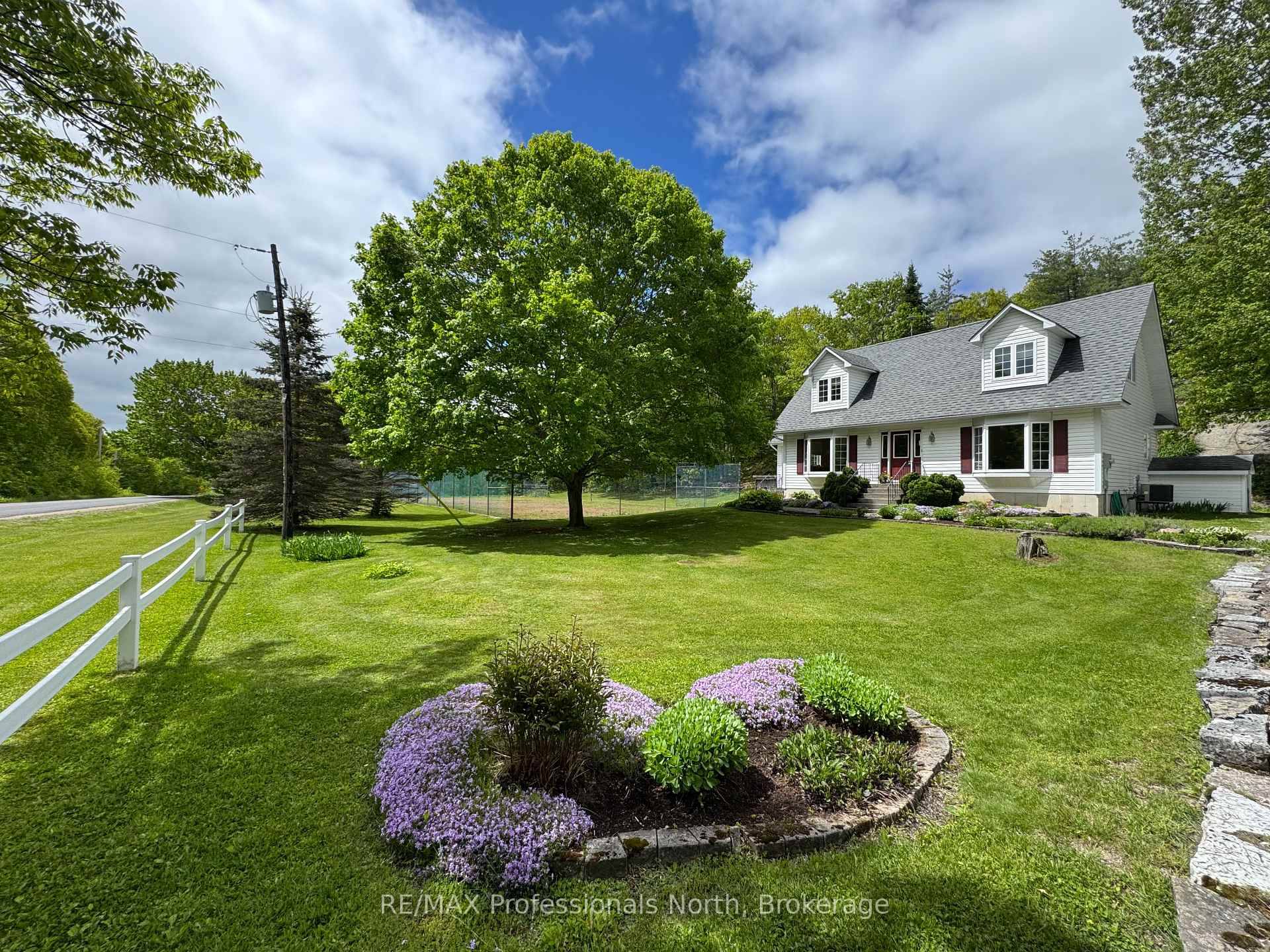Nestled on 64 acres of scenic land, this stunning 3 bedroom, 2 bathroom Royal home offers a tranquil retreat just 15 minutes from the Village of Minden.