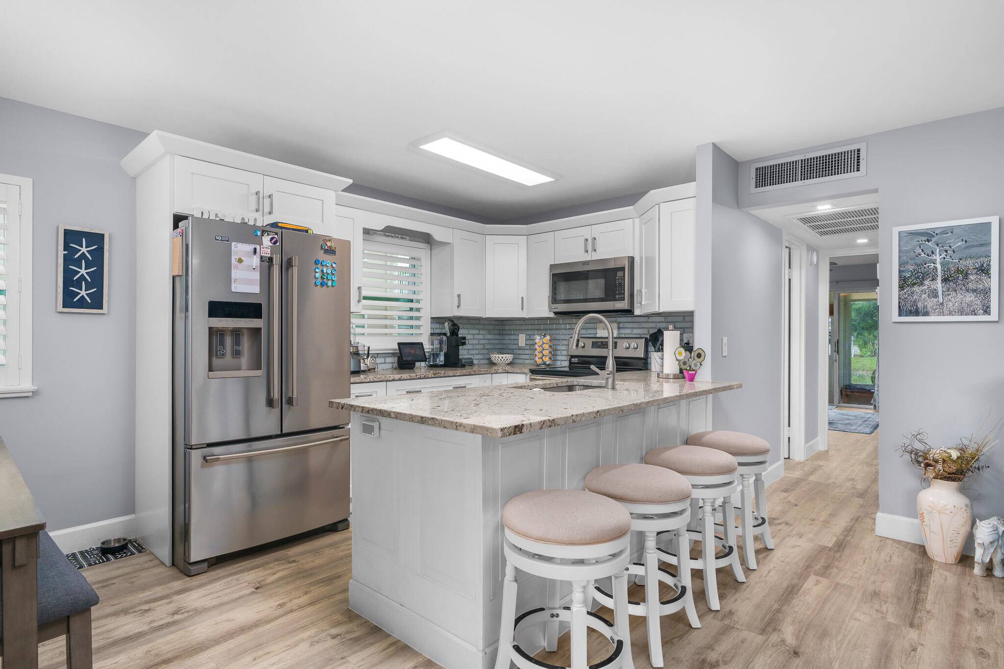 Welcome to your beautifully renovated 2 bedroom, 2 bathroom first floor condo with serene waterfront views in the highly sought after 55 Kings Point community.