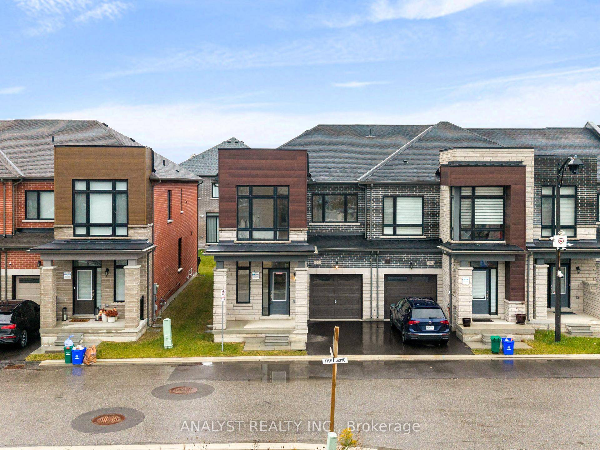 Welcome to this beautifully built 2024 end unit townhouse located in the highly sought after Aurora Trails community, where modern design meets natural surroundings.