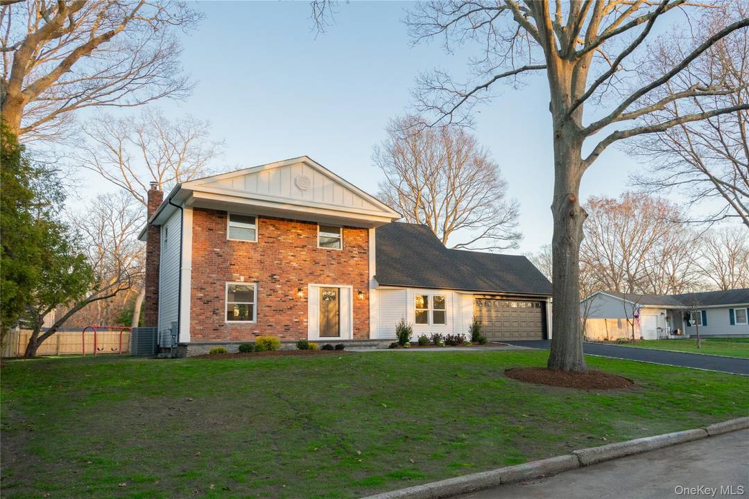 Discover the charm of 7 Howard Drive, Coram, NY where modern style meets comfort in this completely renovated Colonial home.