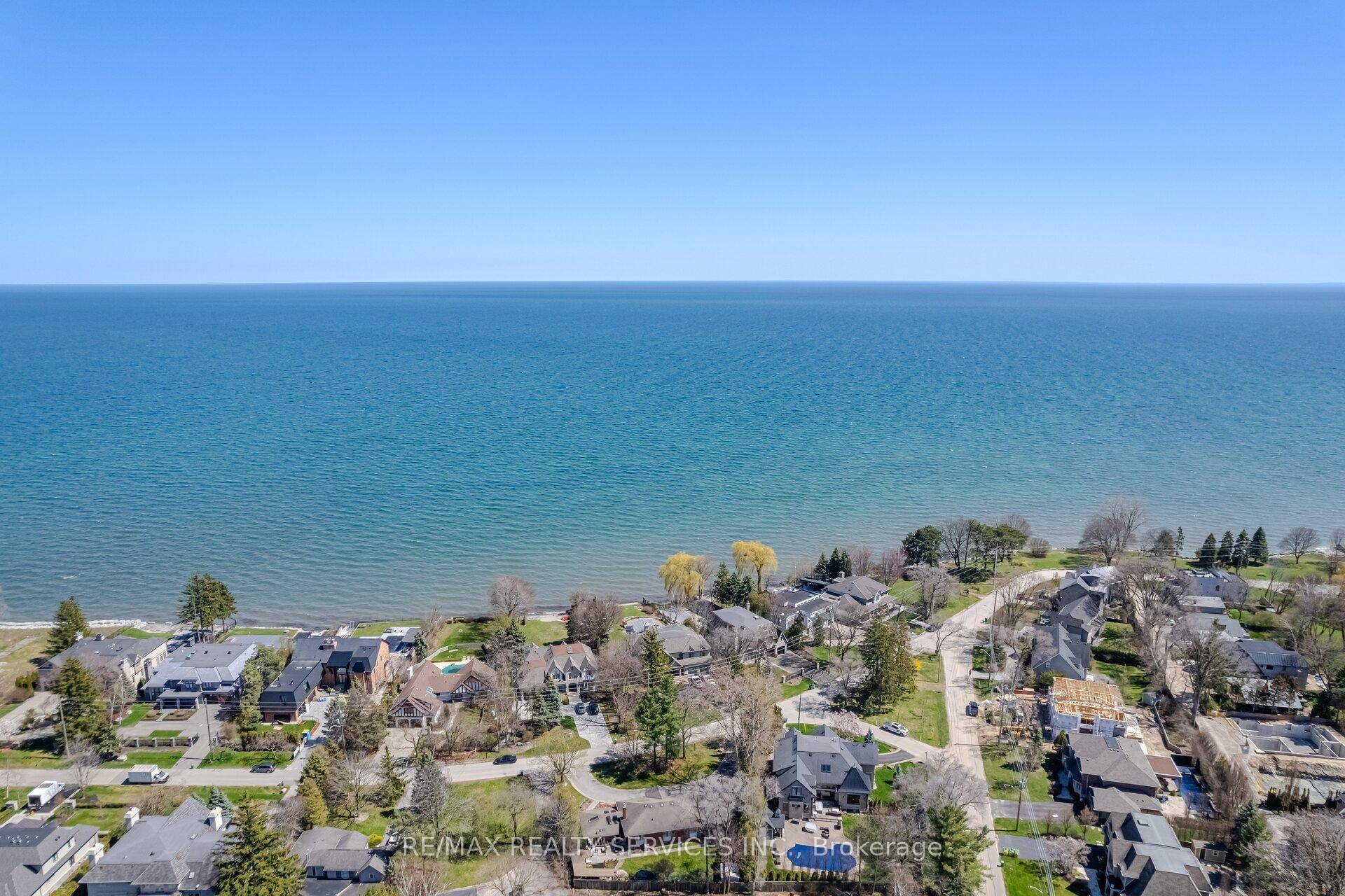THAT View of LAKE ONTARIO FROM YOUR KITCHEN AND LIVING ROOM !