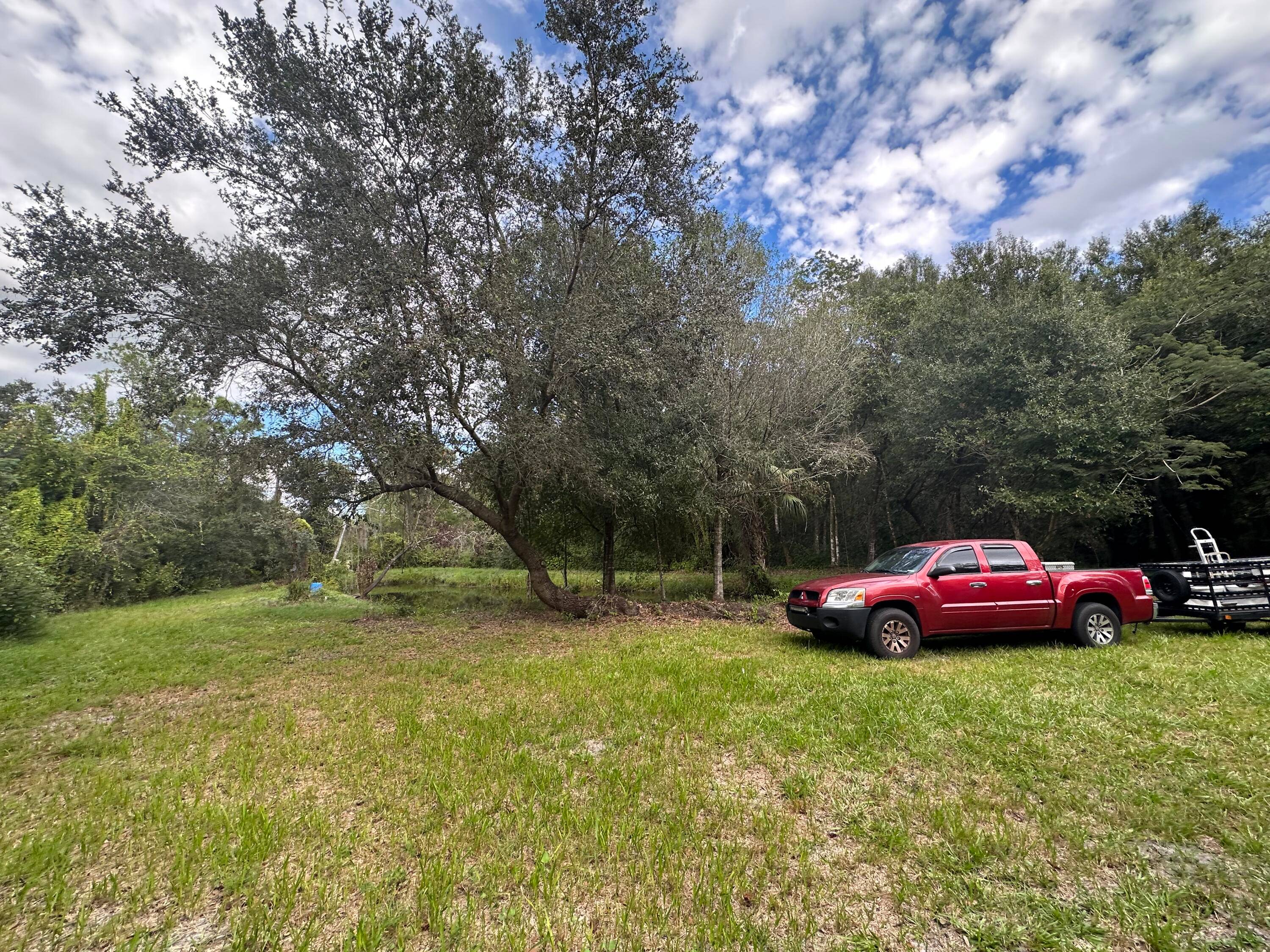 5 ACRE Lot, partially fenced.