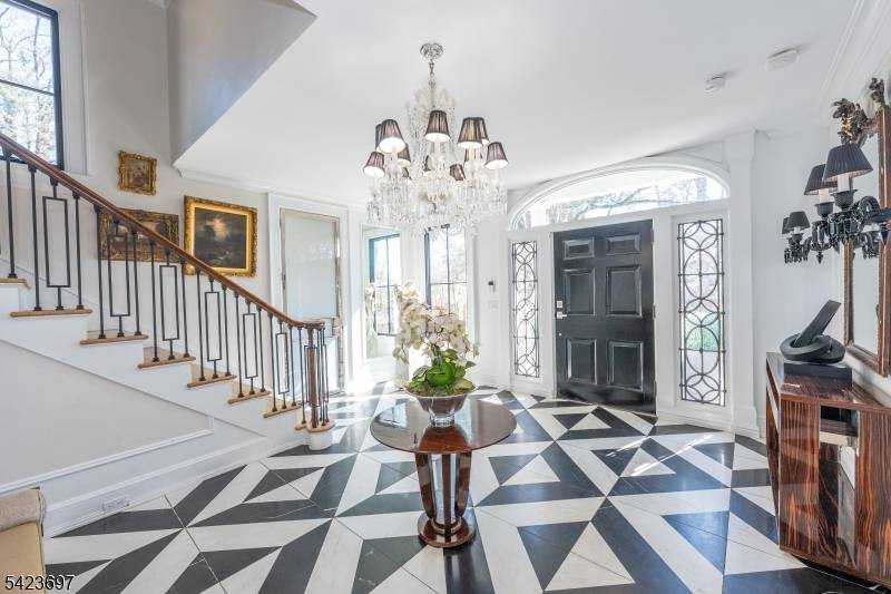 An innovative blend of classic architecture and modernist detail distinguishes this renovated custom residence with equestrian facilities.