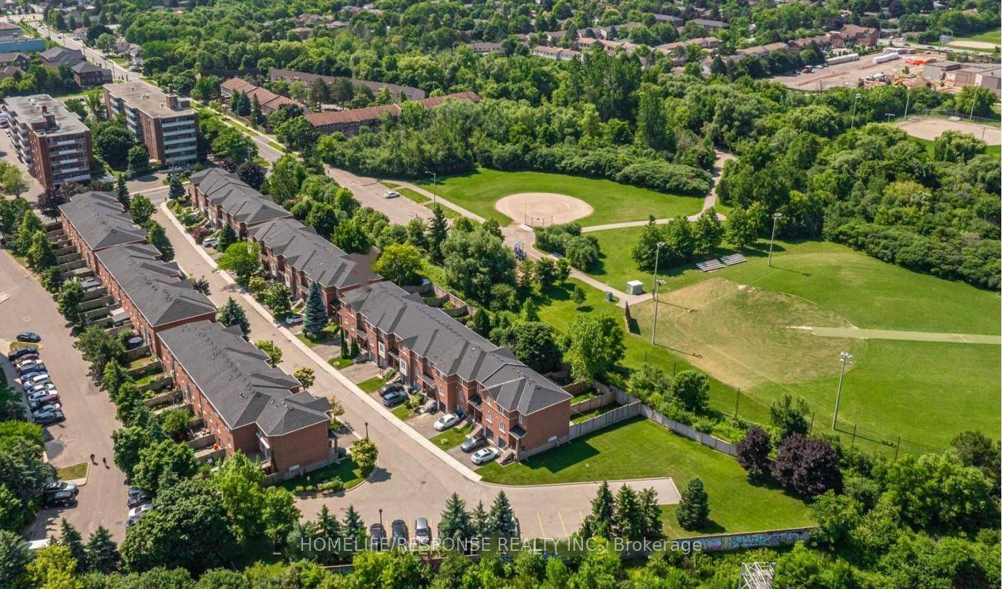 Carefully Maintained, Largest Model In The Complex, Over 1430 Sqft Plus An Unspoiled Walk Out Lower Level To A Large Backyard.