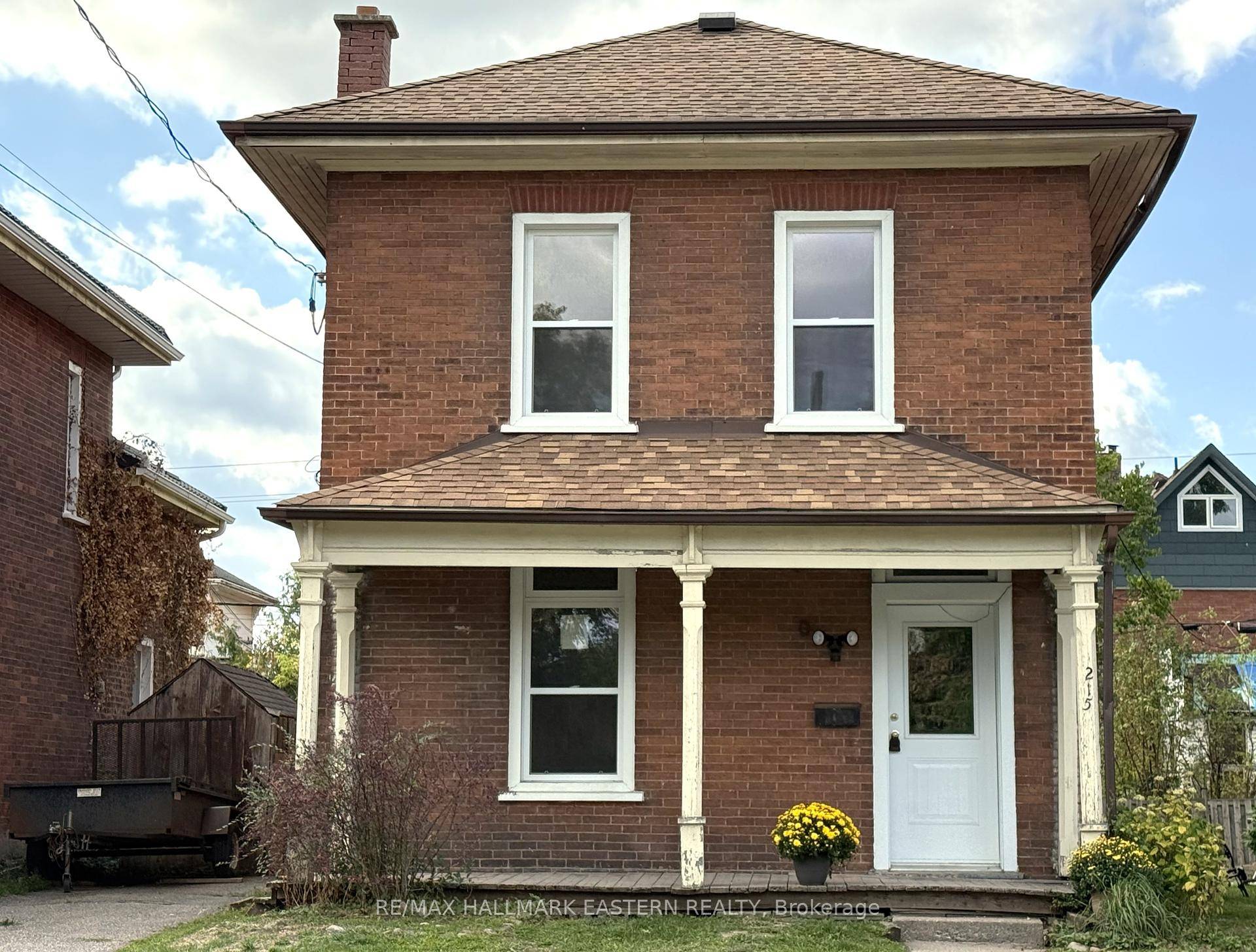 BEAUTIFUL LARGE CENTURY RED BRICK, 2 STOREY HOME FEATURING WIDE HARDWOOD PLANK FLOORS, HIGH CEILINGS, SOLID WOOD TRIM AND BASEBOARDS.